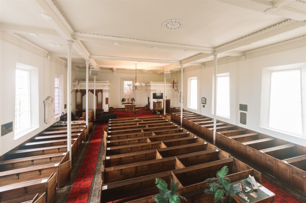 Inside and at the back our church building