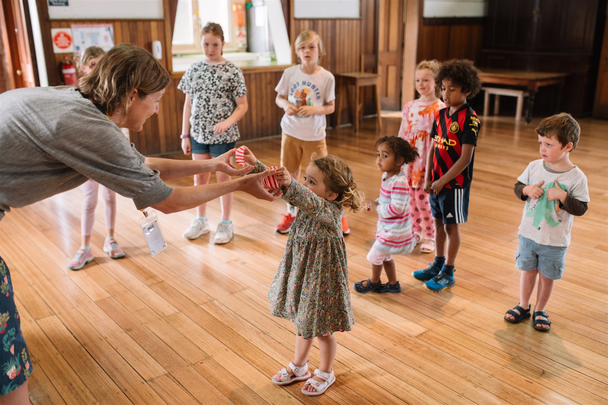 A little girl giving