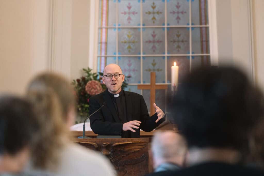 Victor Shaw preaching at church